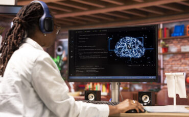 Tech support expert wearing headphones, doing checkup on AI systems