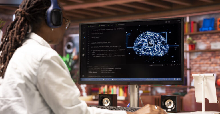 Tech support expert wearing headphones, doing checkup on AI systems